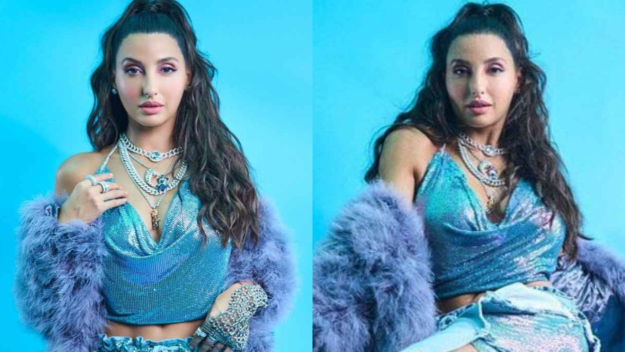 Nora Fatehi resembles modern princess Jasmine in blue fur coat with cowl-neck halter top and denim jeans nora-fatehi-sexy-in-my-dress-hip-hop-india-Nikita-Karizma-style-fashion