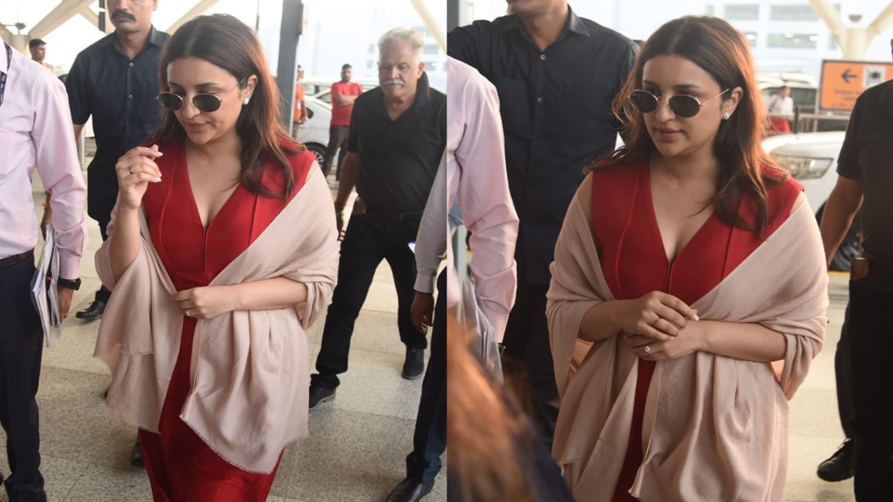 Bride-to-be Parineeti Chopra was spotted at the airport in a red hot jumpsuit, heading towards her wedding venue. (PC: Viral Bhayani)