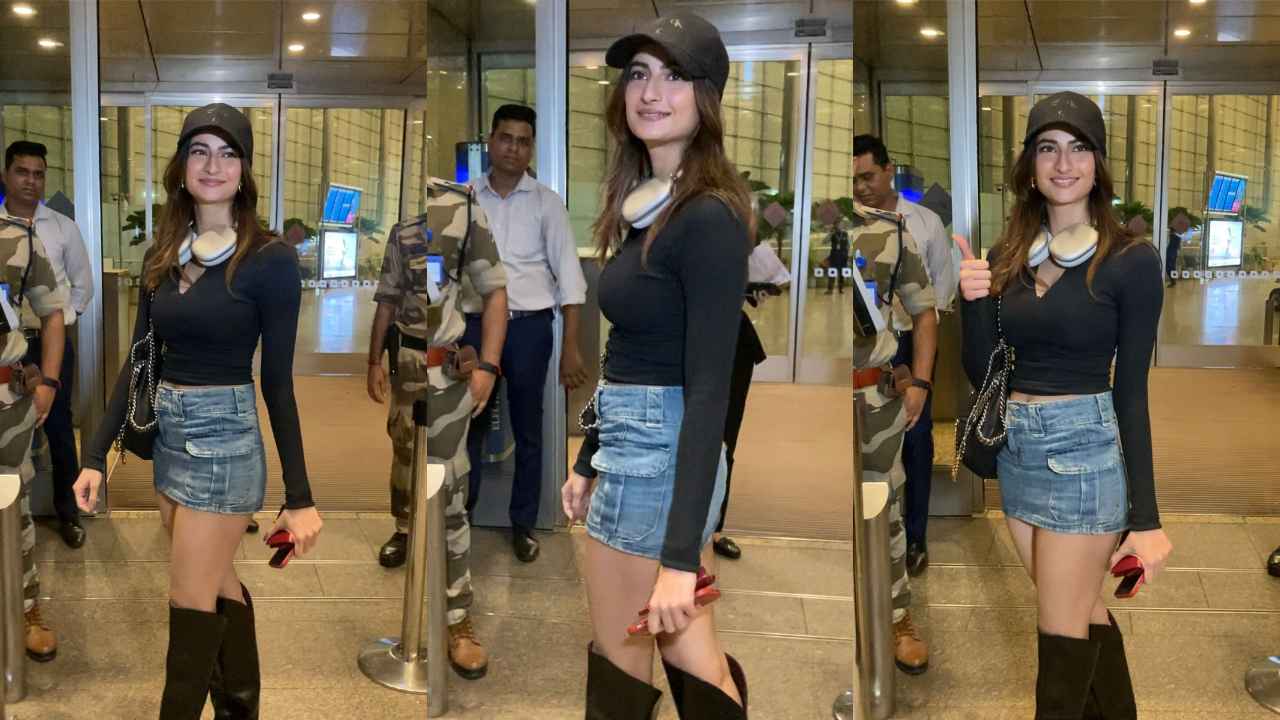 Airport Style: Palak Tiwari pairs crop top with deep neckline, mini-skirt, knee-length boots and luxurious bag