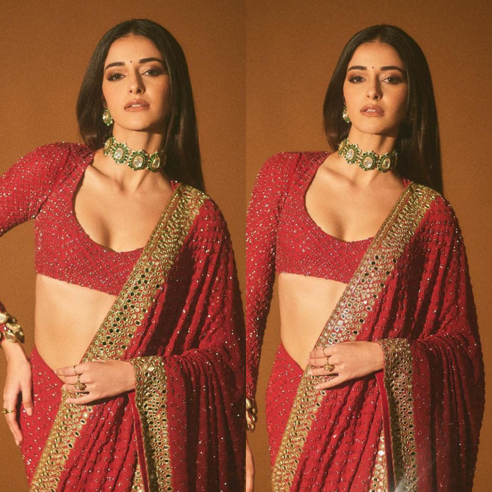 Ananya Panday dons Arpita Mehta's sequin-laden red saree with a beautiful gold border and matching blouse Ananya Panday dons Arpita Mehta's sequin-laden red saree with a beautiful gold border and matching blouse