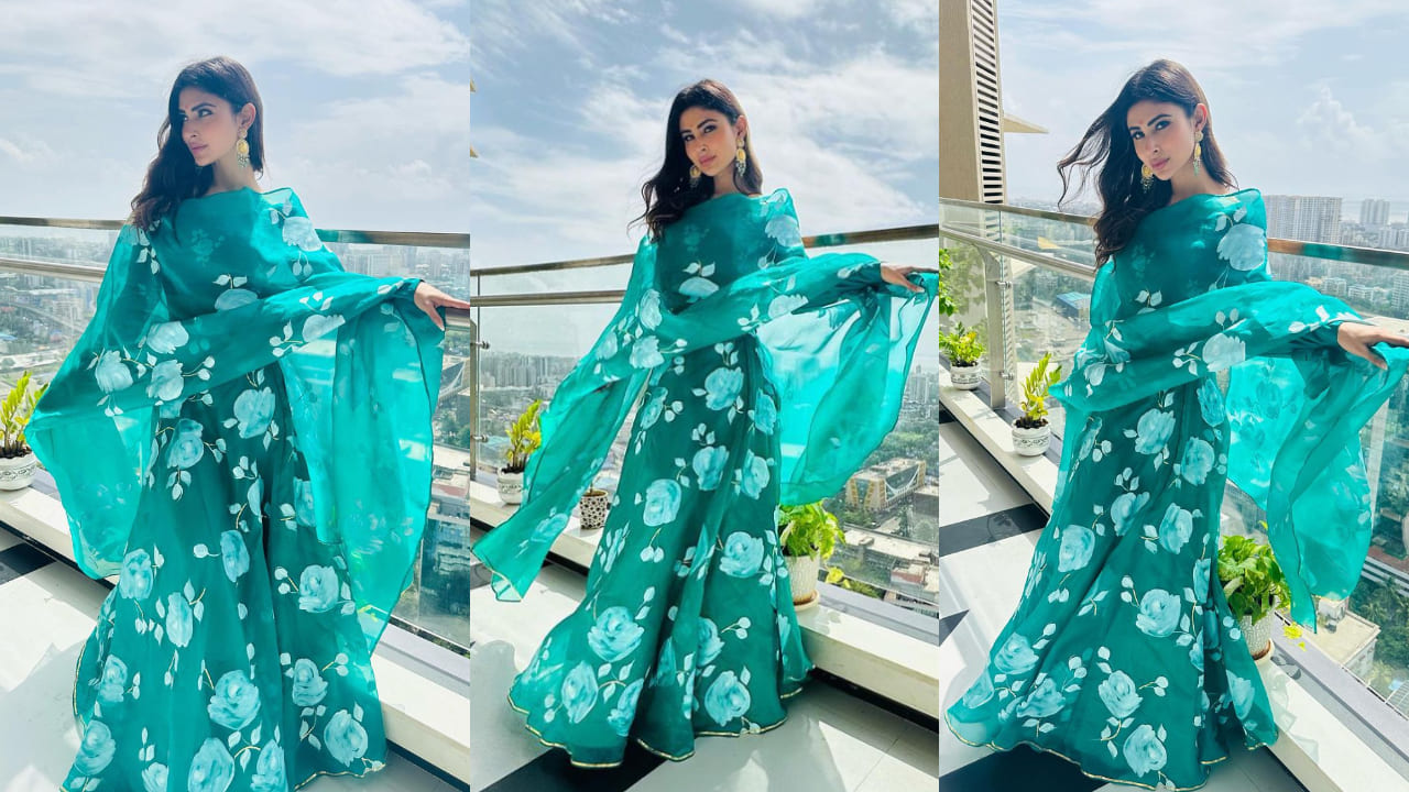 Mouni Roy in an emerald green suit