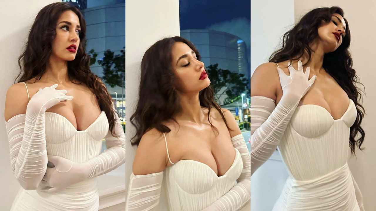 Disha Patani dons a ruched white Alex Perry mini-dress with plunging neckline and matching gloves