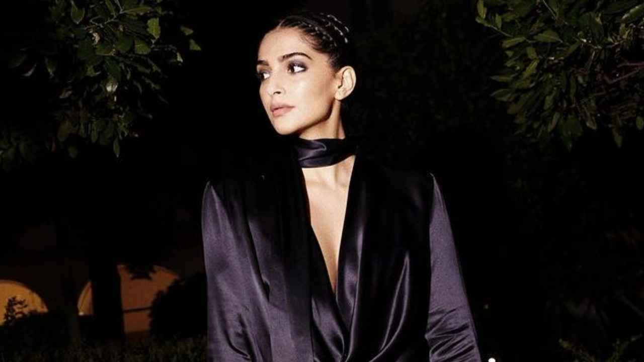 Sonam Kapoor Ahuja attends Hugo Boss’ fashion show in regal blue gown with cowl neck and matching scarf