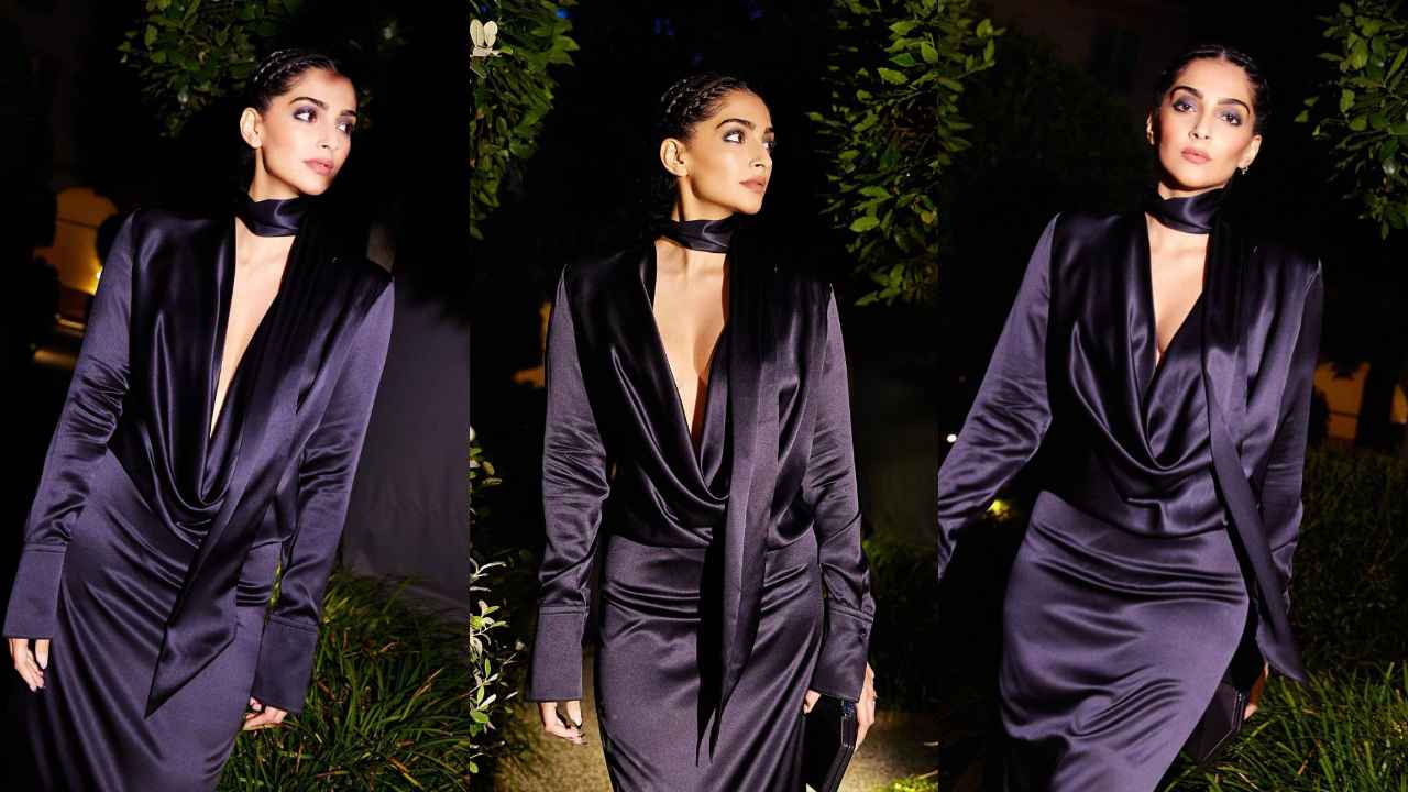 Sonam Kapoor Ahuja attends Hugo Boss’ fashion show in regal blue gown with cowl neck and matching scarf