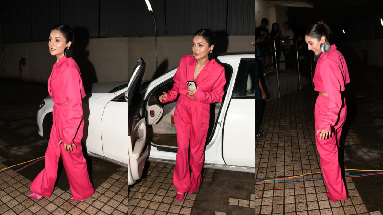 Shehnaaz Gill in a hot pink crop blazer and bell-bottom pants