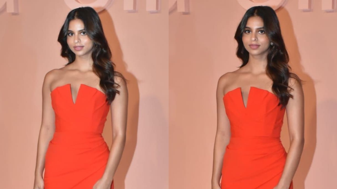 Suhana Khan sizzles in a red strapless gown with a sexy thigh-high slit, goes for a bold no-accessory look | PINKVILLA