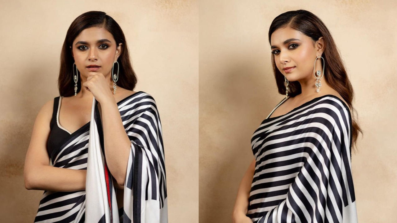 Keerthy Suresh makes your hearts skip a beat as she redefines charm in timeless black and white striped saree (PC: Keerthy Suresh Instagram)