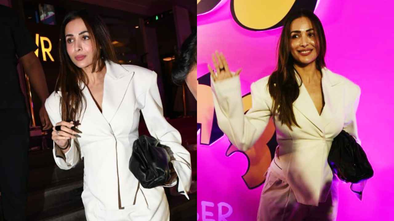 Malaika Arora SLAYS in white corset-like blazer with matching flared pants and an expensive Bottega Veneta bag (PC: Viral Bhayani)
