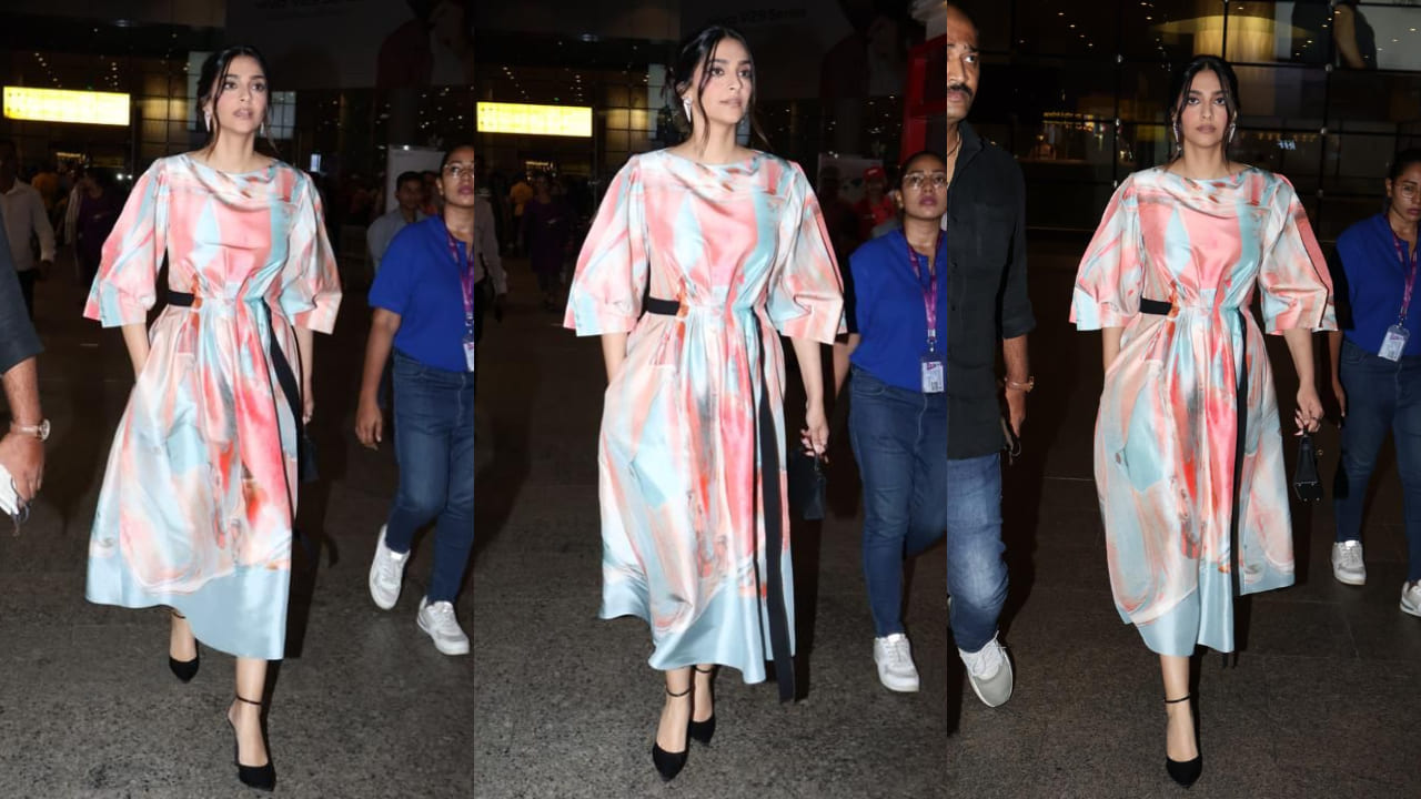 Sonam Kapoor looks oh-so gorgeous in a marble printed dress with black drawstring.