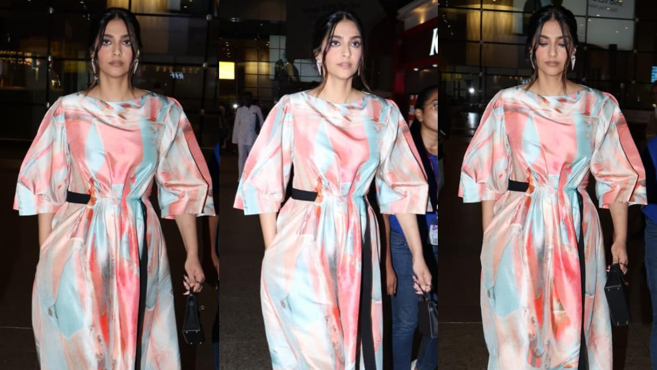 Sonam Kapoor looks oh-so gorgeous in a marble printed dress with black drawstring.