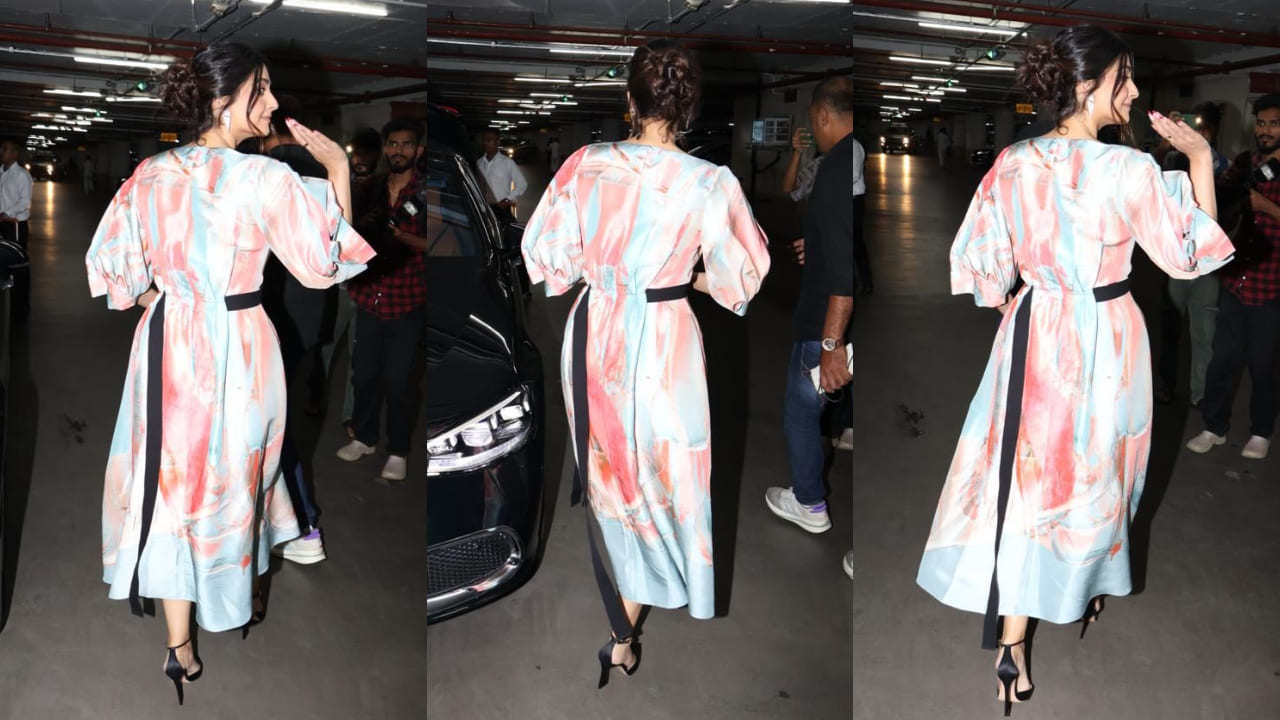 Sonam Kapoor looks oh-so gorgeous in a marble printed dress with black drawstring.