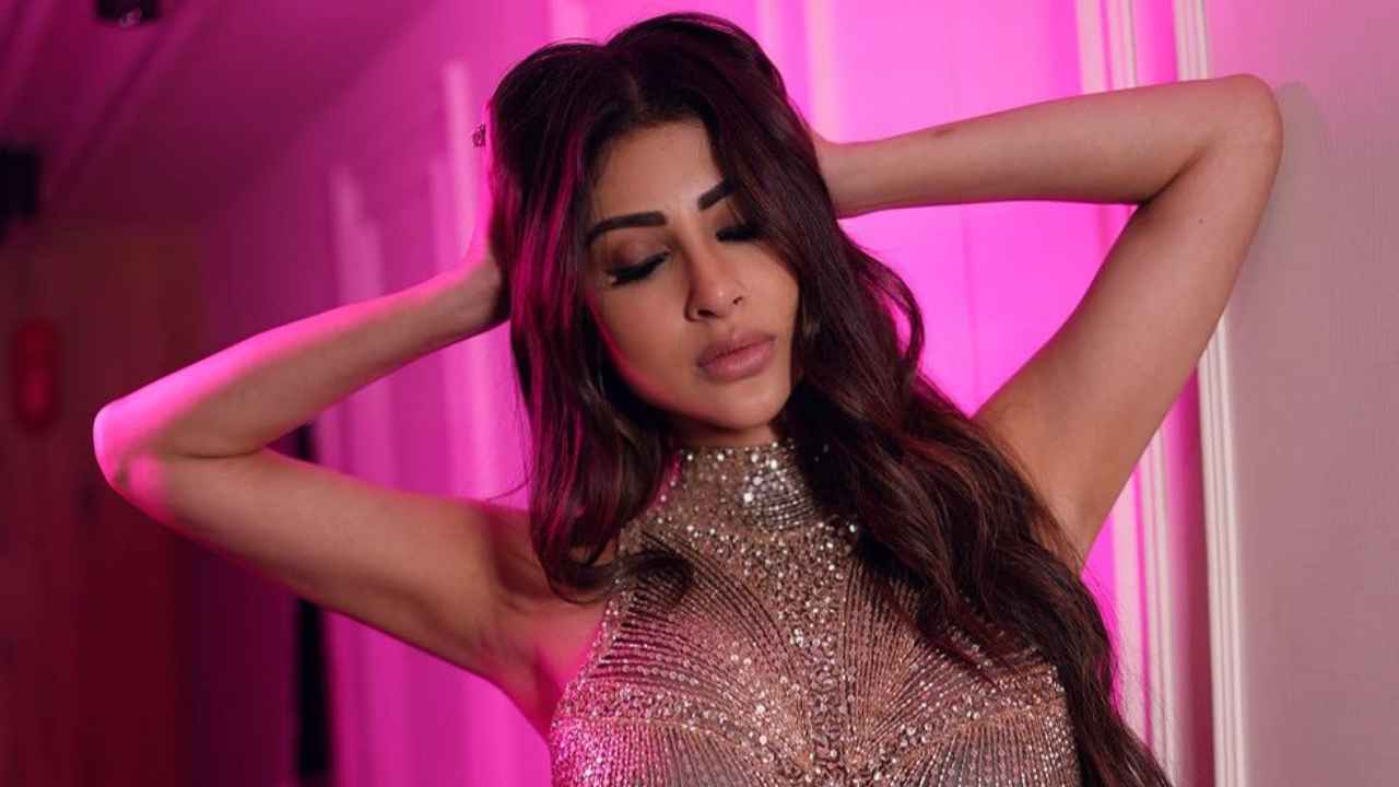 Bookmark Mouni Roy’s sultry sequin embellished semi-sheer body-hugging gown for your next soiree