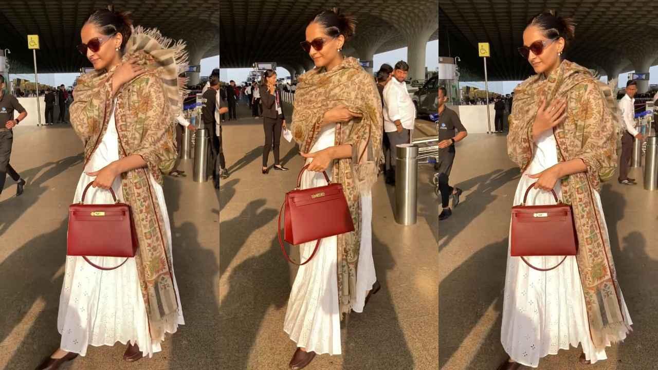 Sonam Kapoor Ahuja redefines airport elegance in white Anarkali suit, beige shawl, and Rs. 9,40,545 Hermes bag (PC: APH Images)