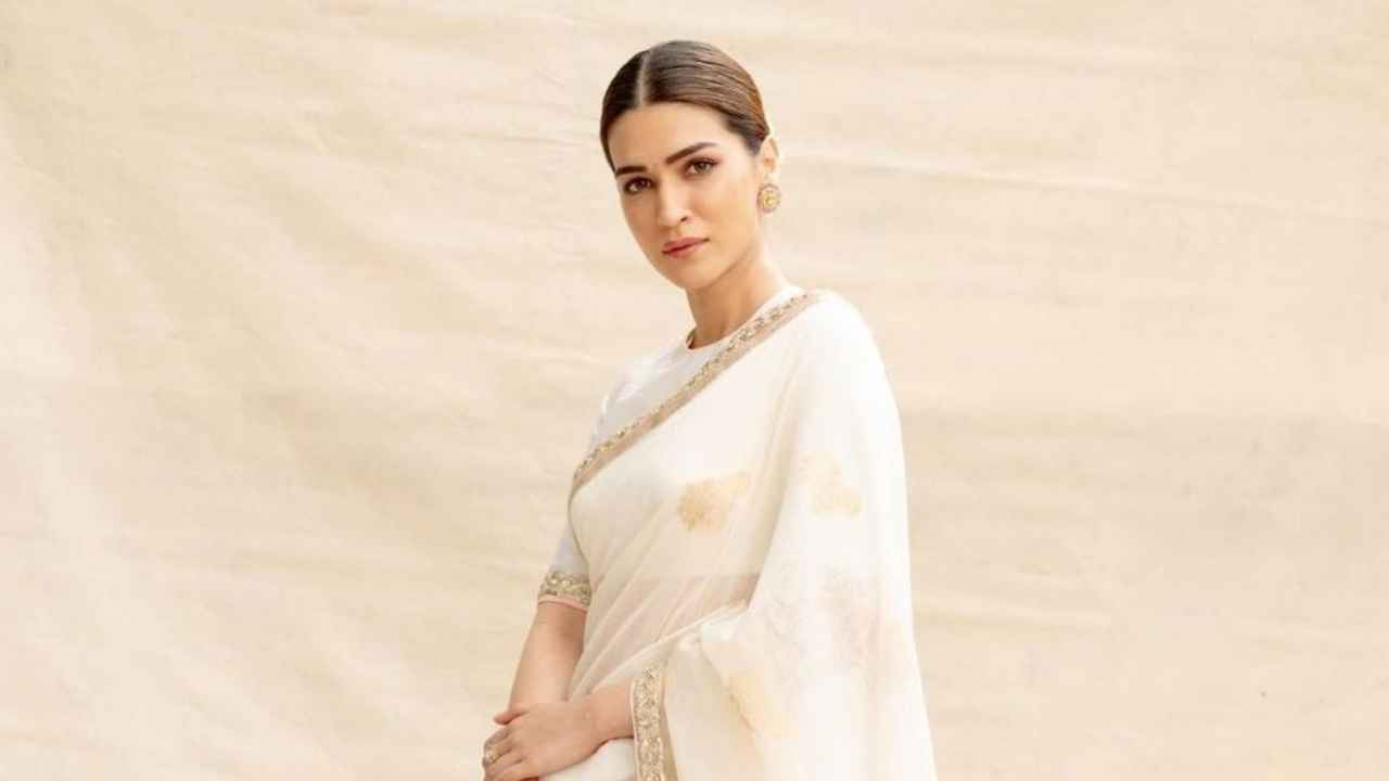 Kriti Sanon STUNS in white custom Manish Malhotra saree with gold border and pastel hues; every ethnic lover’s dream