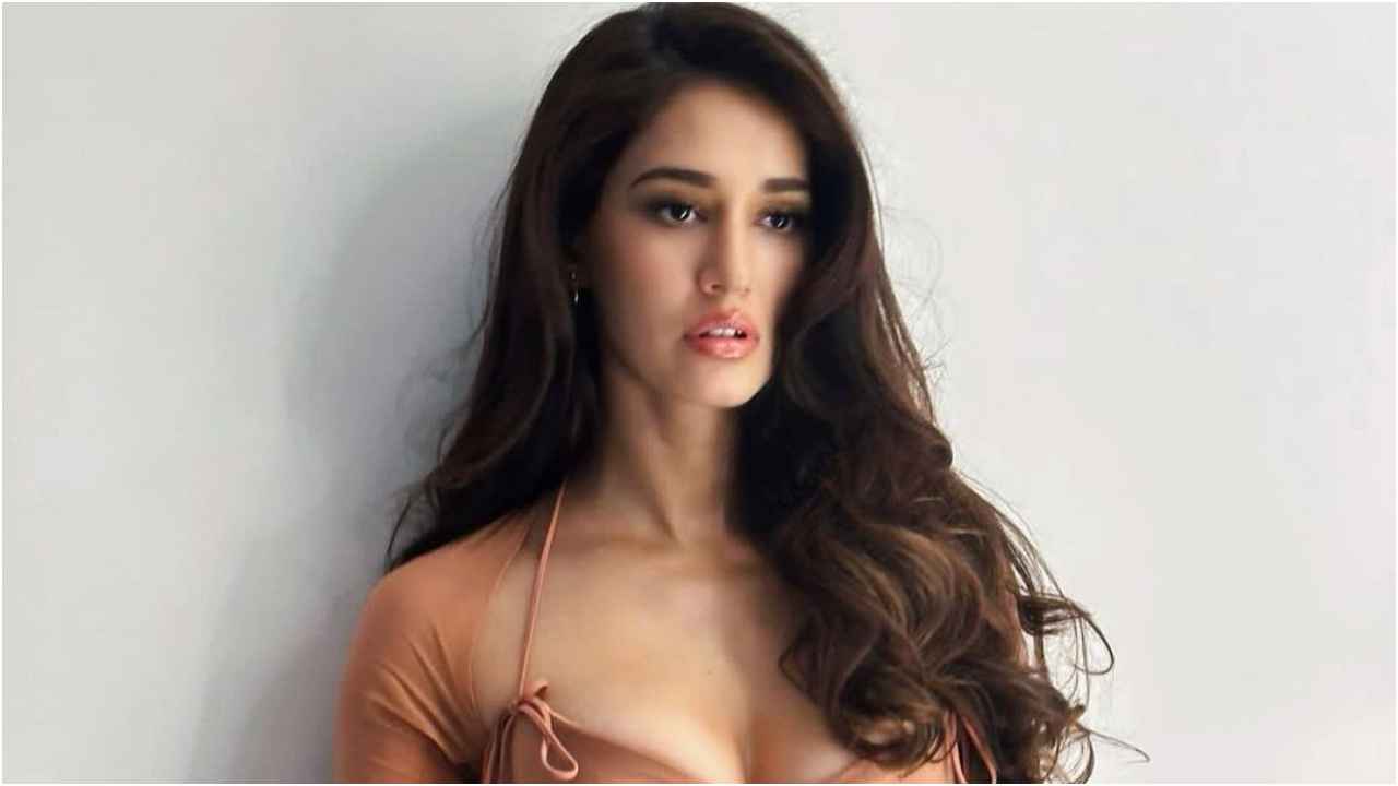 Disha Patani is TOO HOT TO HANDLE in halter neck mini-dress with body-hugging silhouette and plunging neckline