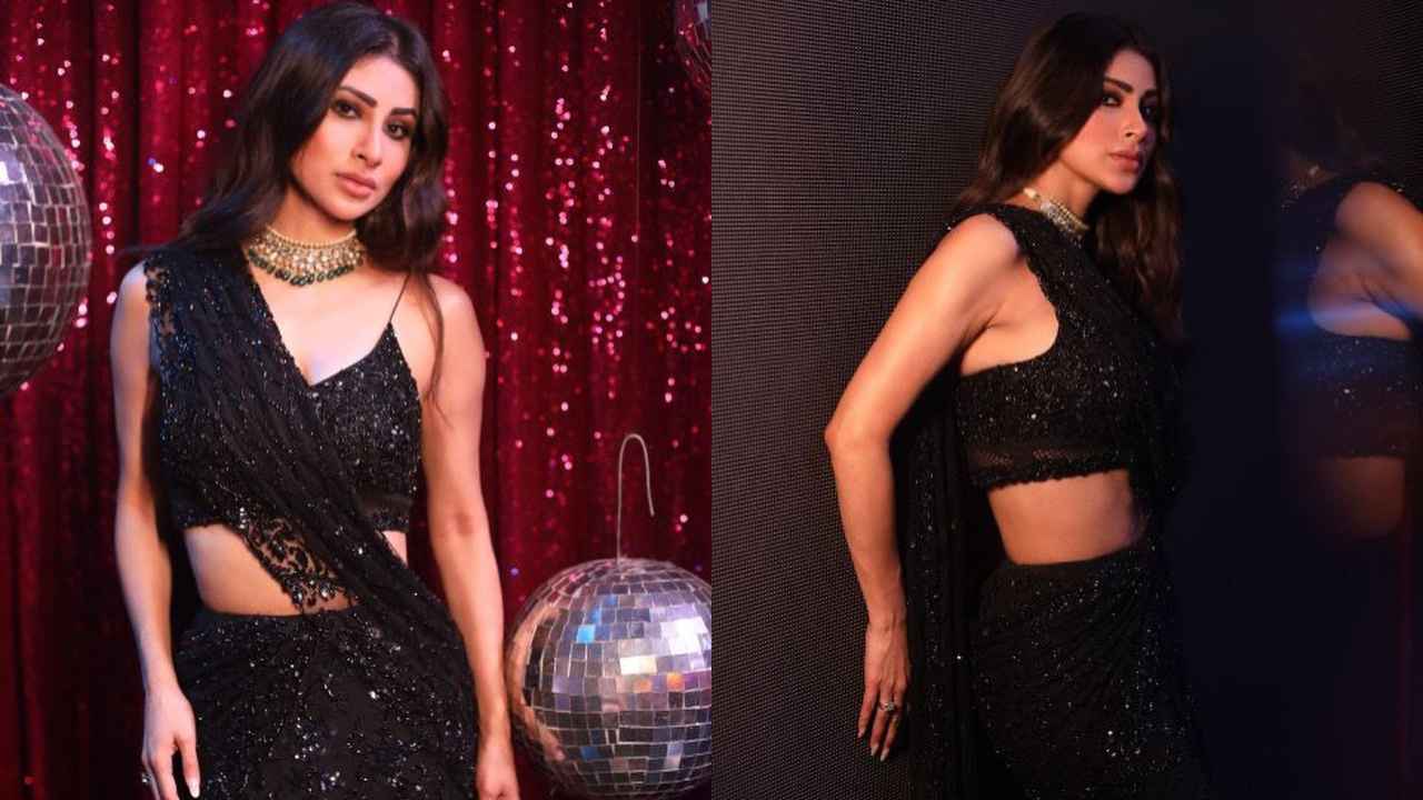 Mouni Roy looks bewitching in Prémya by Manishii’s black shimmery fishtail saree with matching bustier blouse