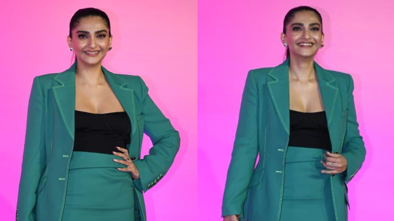 Sonam Kapoor rocks the red carpet in a jade green blazer with a matching draped skirt. (PC: Viral Bhayani)
