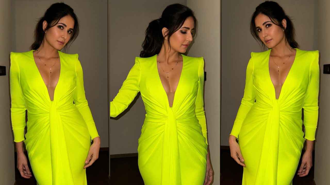 Katrina Kaif aces the neon game in Alex Perry’s front tie gown with formal shoulder pads and plunging neckline (Amit Thakur Instagram)