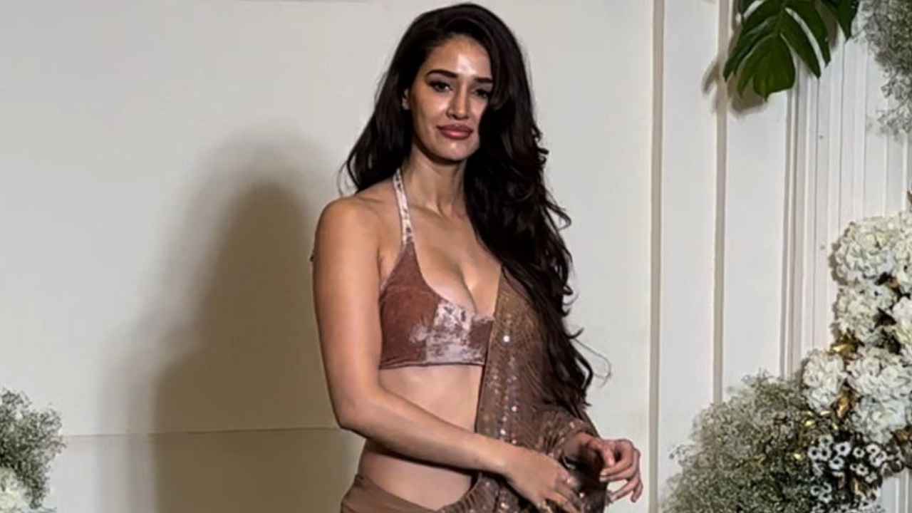 Disha Patani personifies a FIRECRACKER in a brown sequinned Manish Malhotra saree with plunging halter blouse (PC: Manav Manglani)