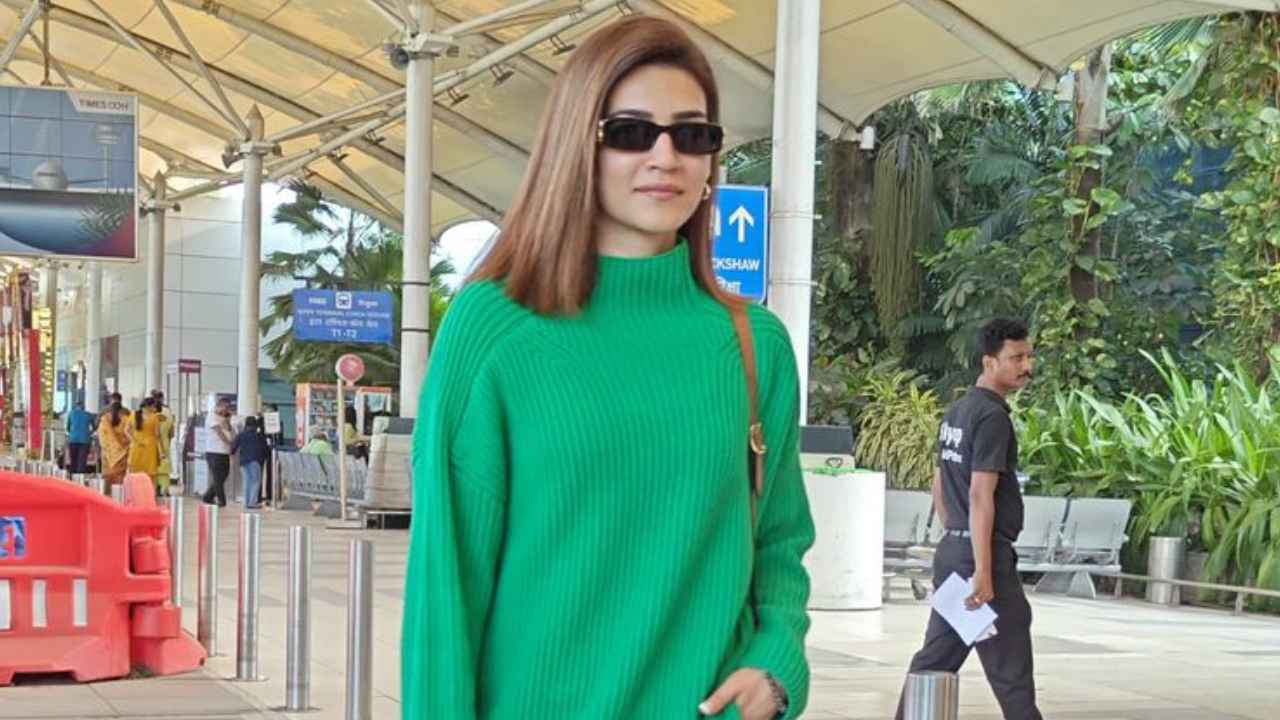 Kriti Sanon sets winter wear goals in green cardigan with baggy denims, and Rs. 2.36 lacs Louis Vuitton bag (PC: Viral Bhayani)