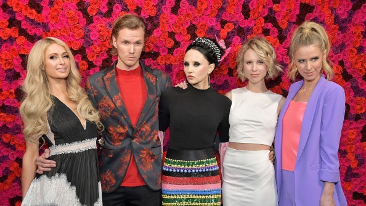 Baron Hilton II with his siblings