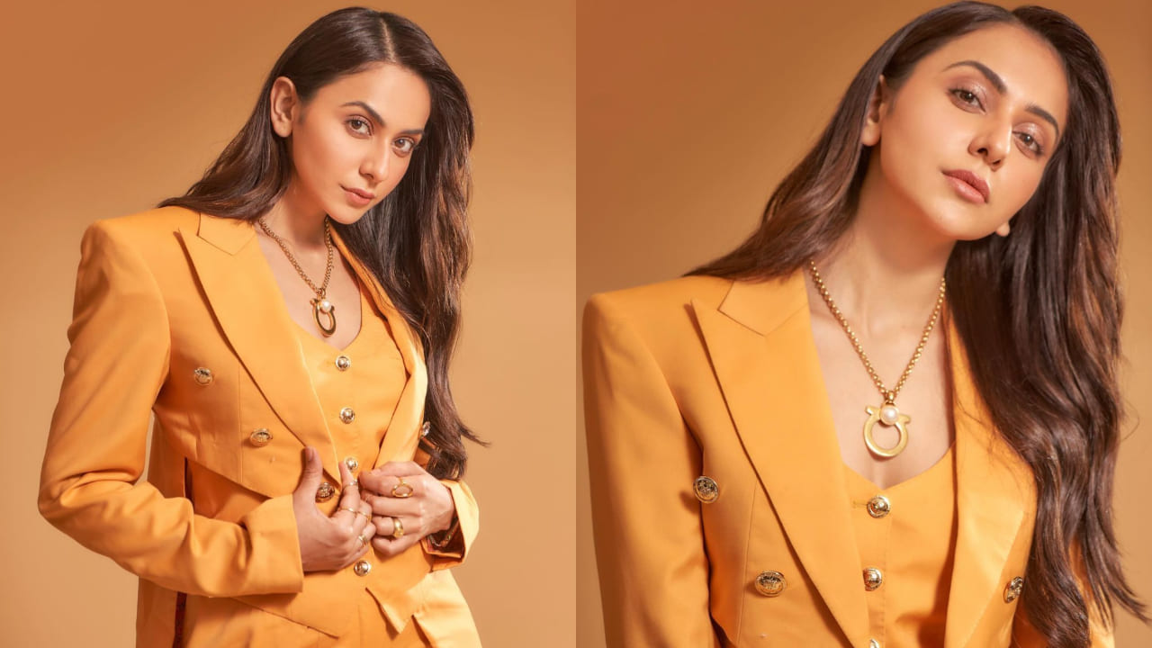Rakul Preet Singh in mango orange colored blazer fashion style