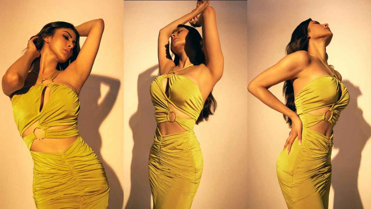 Mouni Roy expressed HOTNESS in a Rs 46,996 halter neck gown with a Hot & sexy cut out design and front slit
