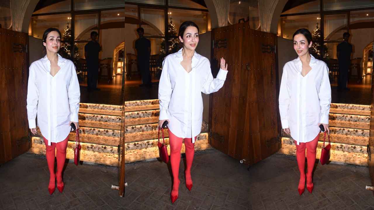Malaika Arora Go With No Pants Trend With Long White Shirt And Red Stockings