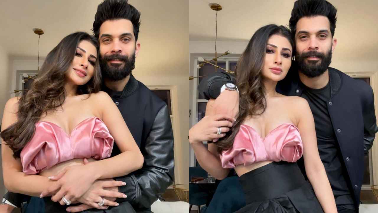 Mouni Roy Celebrate new year eve in Blush Pink and Black Strapless midi dress