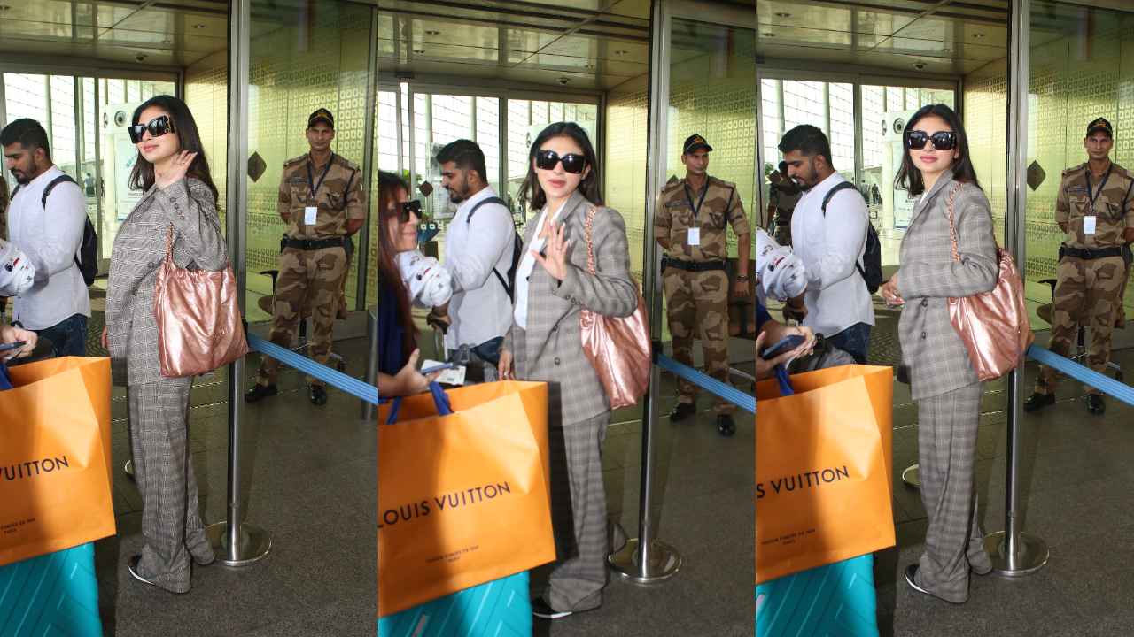 Mouni Roy makes a case for power dressing with her airport look in grey pantsuit and Rs 5.77 lacs Chanel bag (PC: Viral Bhayani)