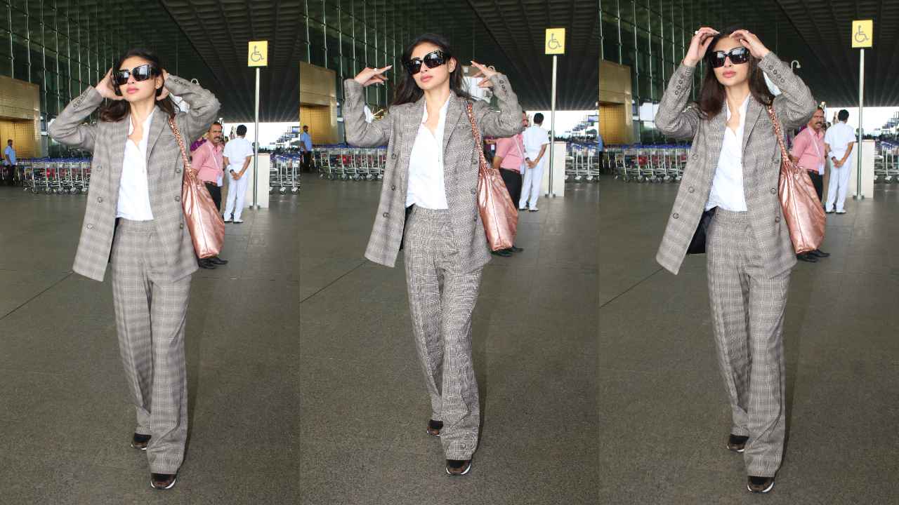 Mouni Roy makes a case for power dressing with her airport look in grey pantsuit and Rs 5.77 lacs Chanel bag (PC: Viral Bhayani)