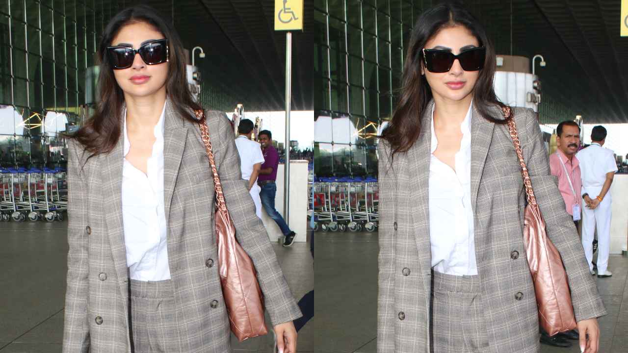 Mouni Roy makes a case for power dressing with her airport look in grey pantsuit and Rs 5.77 lacs Chanel bag (PC: Viral Bhayani)