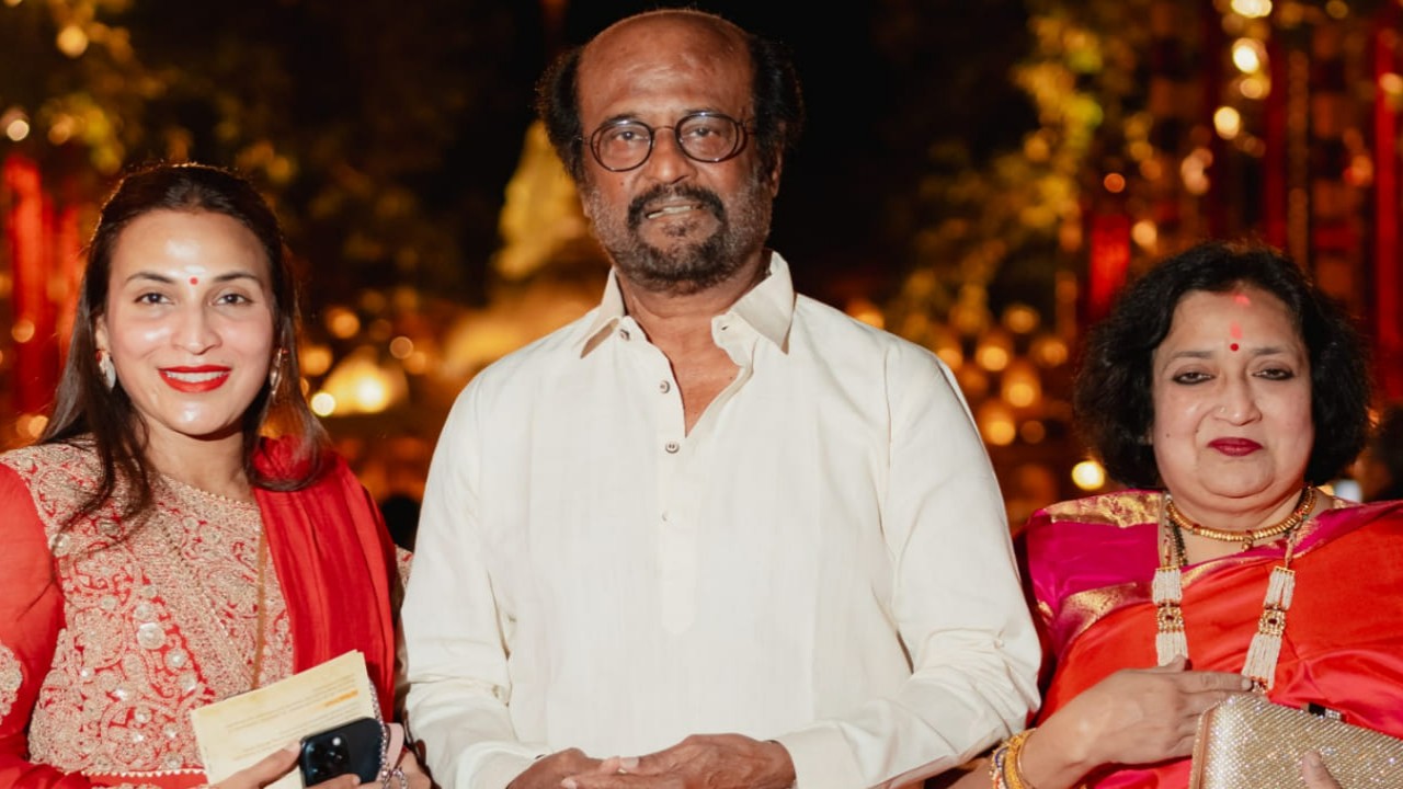 Rajinikanth sports mundu look as he poses with wife Latha, daughter Aishwarya at Anant Ambani and Radhika Merchant’s pre-wedding event