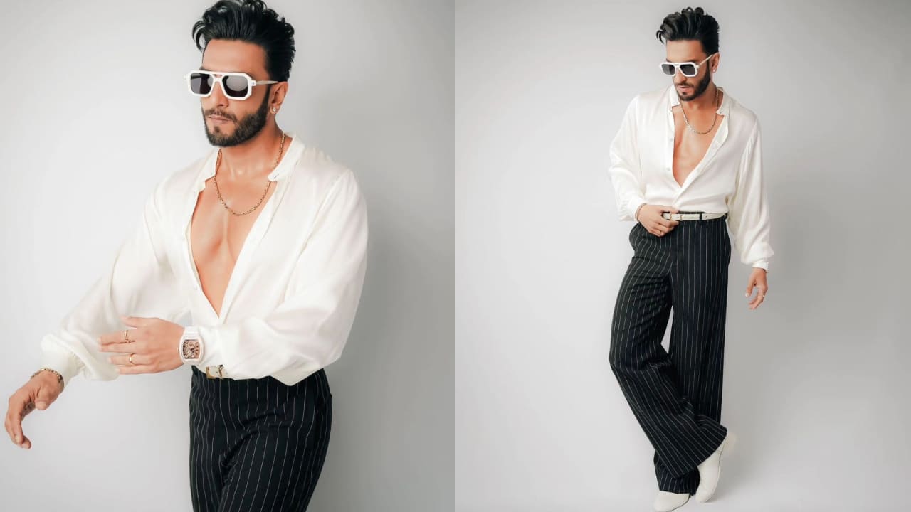 Ranveer Singh in wide leg pants and satin shirt