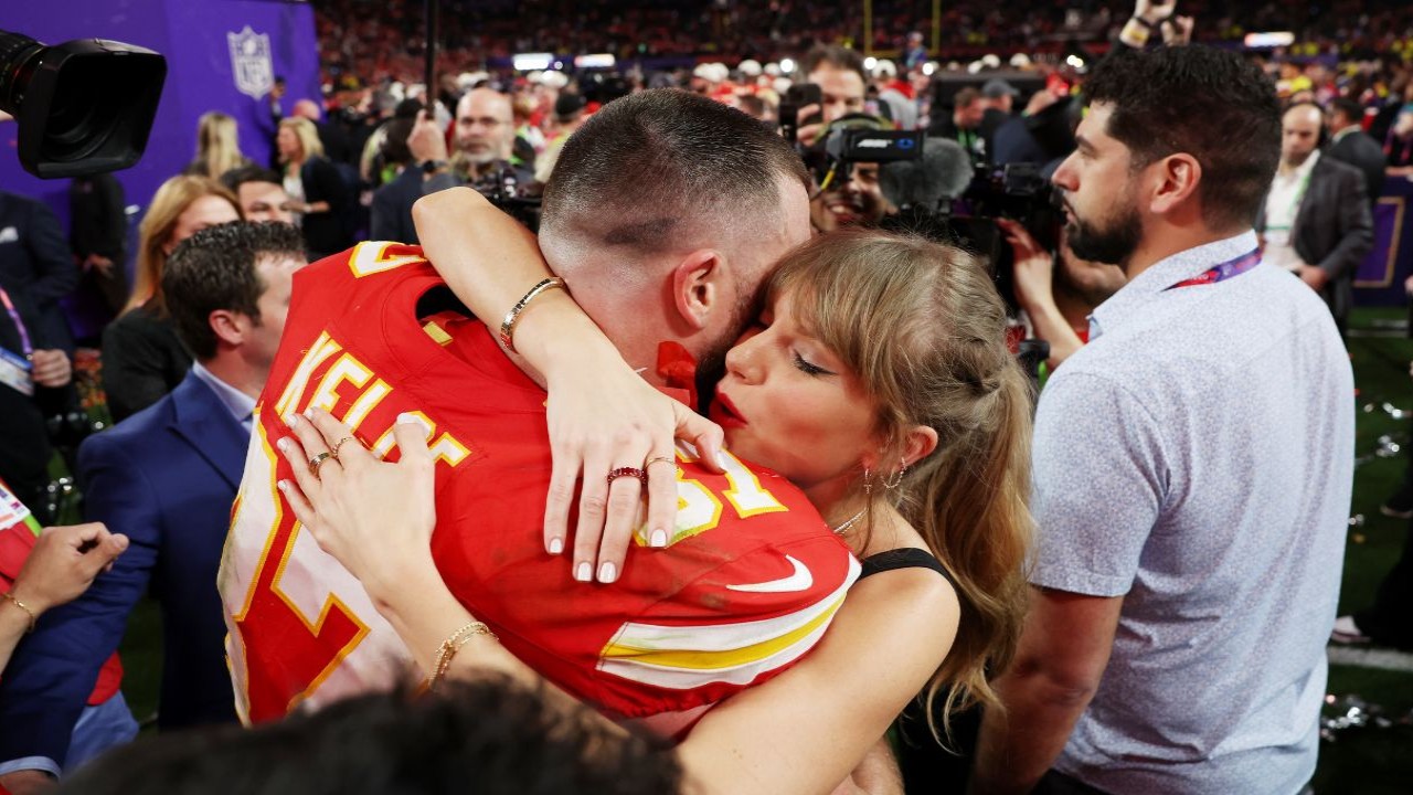 Travis Kelce Drinks Beer From a Trophy After Auctioning Taylor Swift’s Tour Tickets at Mahomes’ Charity Event