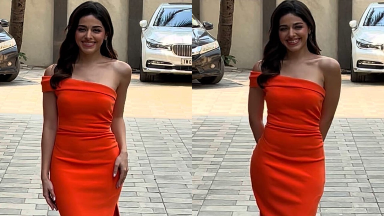 Alaya F's bright orange one-shoulder dress is capable of outshining even the sunset; take cues