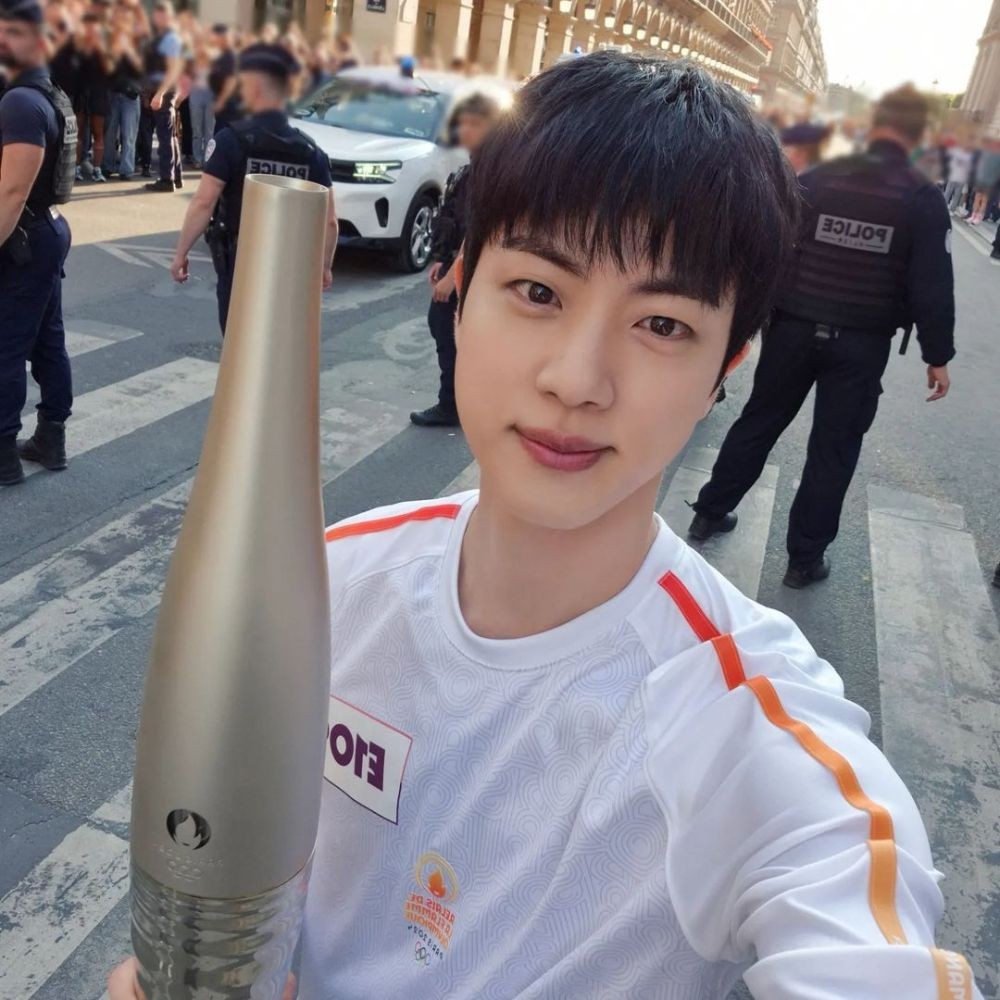 BTS’ Jin returns to South Korea after participating in torch relay at 2024 Paris Olympi...