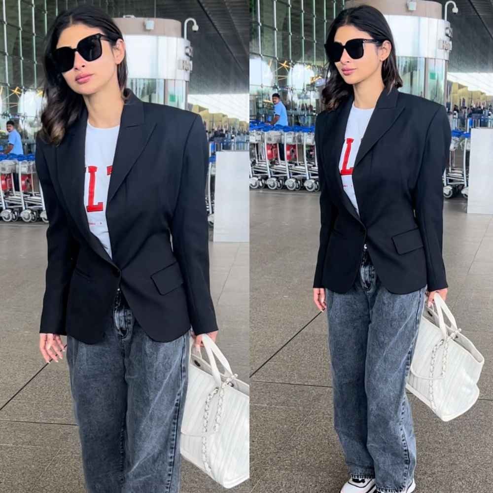Mouni Roy makes a case for understated elegance in airport fit with black blazer, baggy jeans, and sneakers Mouni Roy makes a case for understated elegance in airport fit with black blazer, baggy jeans, and sneakers