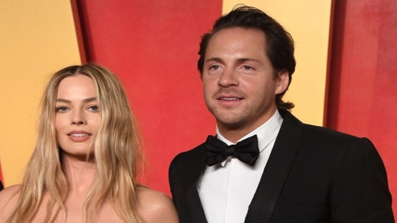 Margot Robbie and Tom Ackerley (Getty Images)