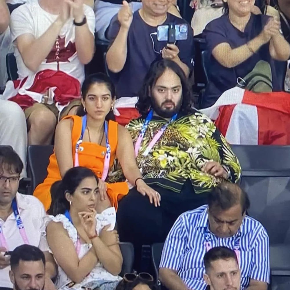 Radhika Merchant gives Paris a zesty touch in her bright orange Versace co-ord set paired with Goyard plummet bag at Olympics 2024  Radhika Merchant gives Paris a zesty touch in her bright orange Versace co-ord set paired with Goyard plummet bag at Olympics 2024