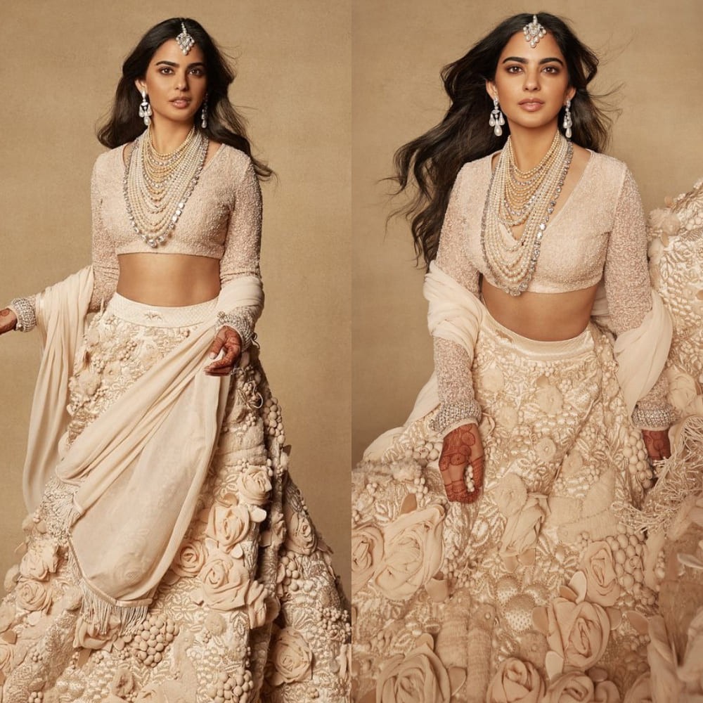 Isha Ambani's ivory Sabyasachi lehenga from Anant-Radhika's wedding festivities surpasses any field of flowers in its beauty