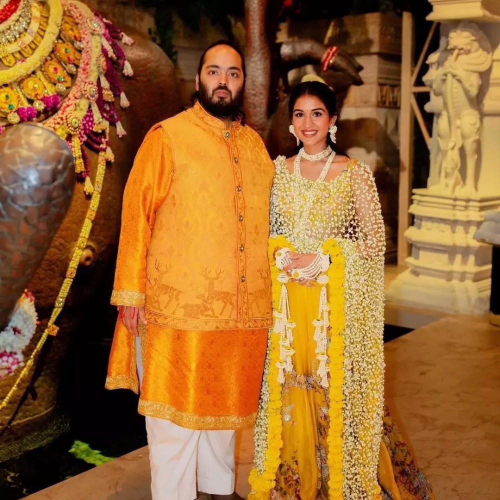 Bride-to-be Radhika Merchant shines bright in stunning Anamika Khanna outfits, but it's her dupatta made from jasmine buds that truly steals the show