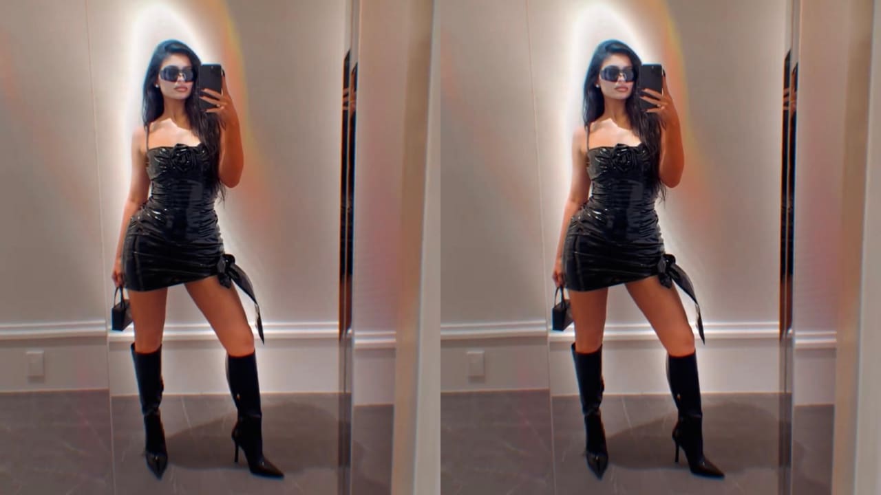 Kylie Jenner in black latex dress