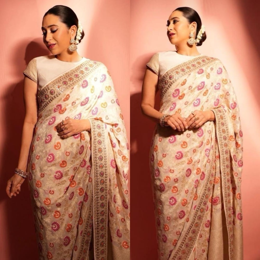 Karisma Kapoor dials up the festive glam in a cream-hued floral saree worth Rs. 99,000 and we're here for it