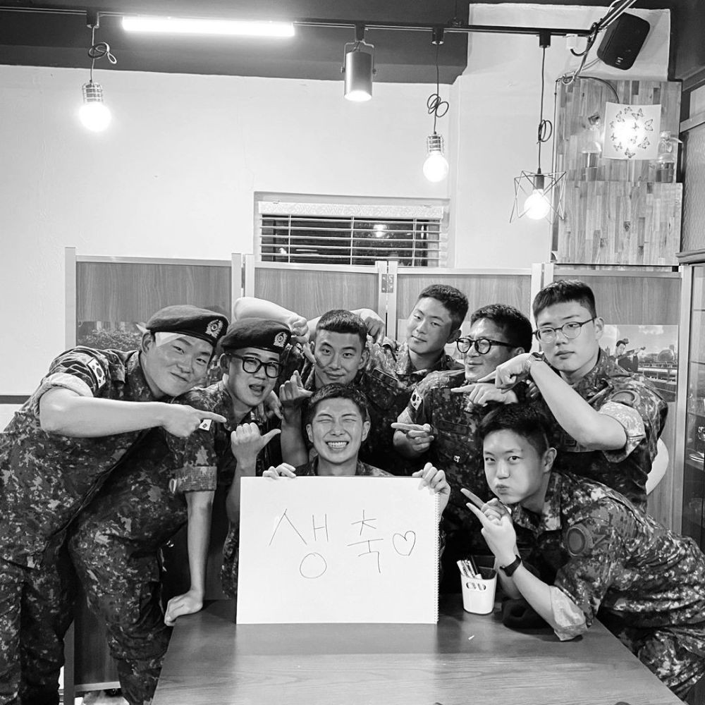 BTS’ RM visits birthday fan event at café with fellow military men, poses with soldier ...
