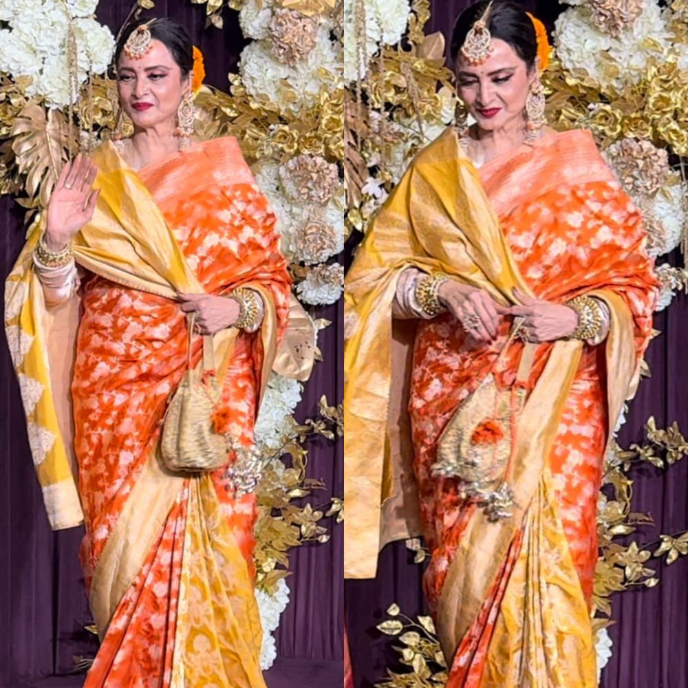 Rekha dazzles in orange Kanjeevaram saree and wears it not with gajra but genda phool at Manish Malhotra's Diwali party Rekha dazzles in orange Kanjeevaram saree and wears it not with gajra but genda phool at Manish Malhotra's Diwali party