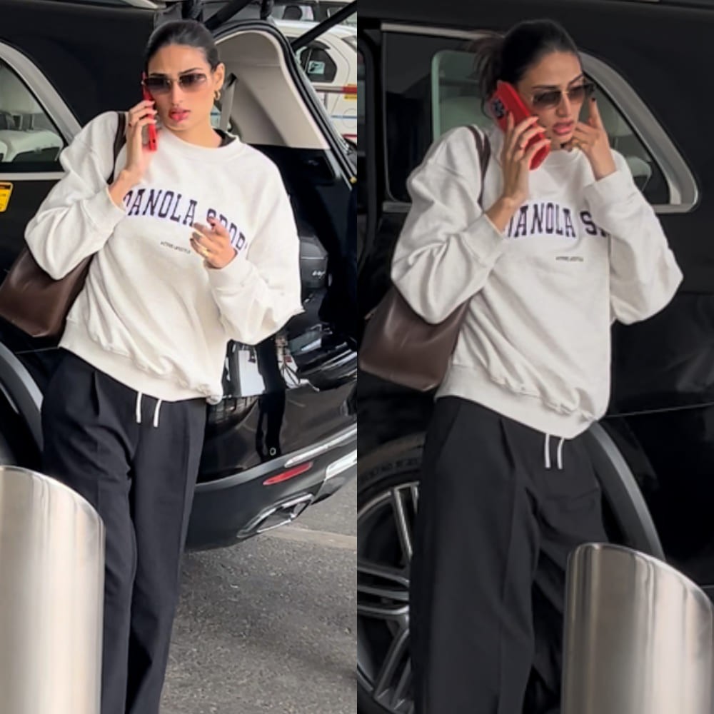 Mom-to-be Athiya Shetty keeps her airport look comfy and sporty in track pants and swea...