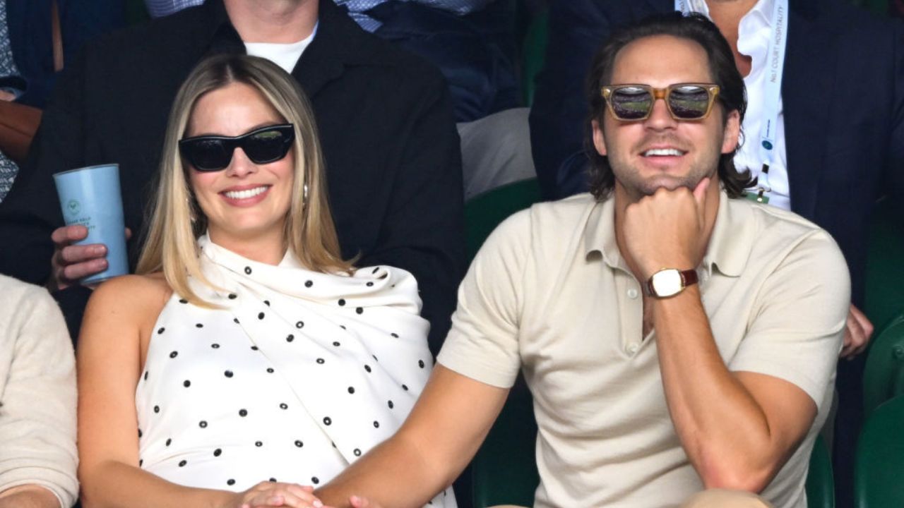 Margot Robbie and Tom Ackerley (via Getty Images)