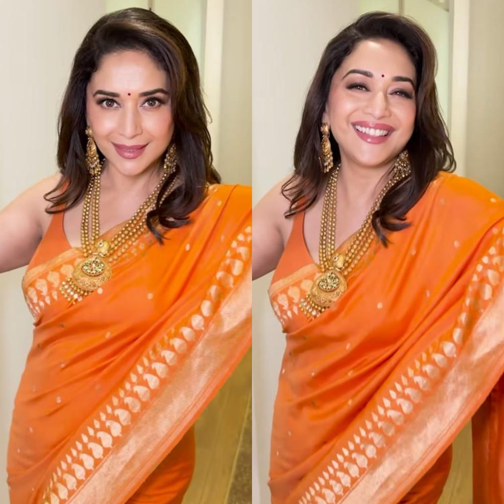 90s queen Madhuri Dixit has our hearts going Dhak Dhak all over again in a stunning bright orange saree 90s queen Madhuri Dixit has our hearts going Dhak Dhak all over again in a stunning bright orange saree