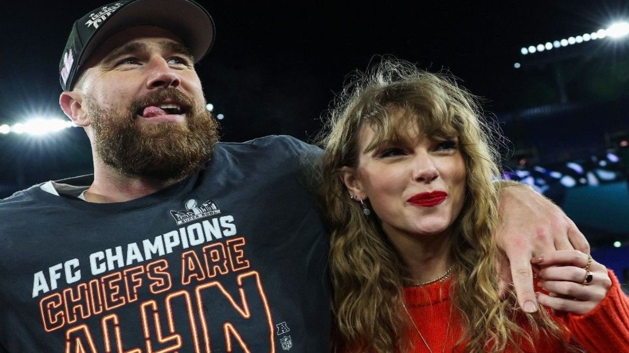 Taylor Swift with Travis Kelce (via Getty Images)